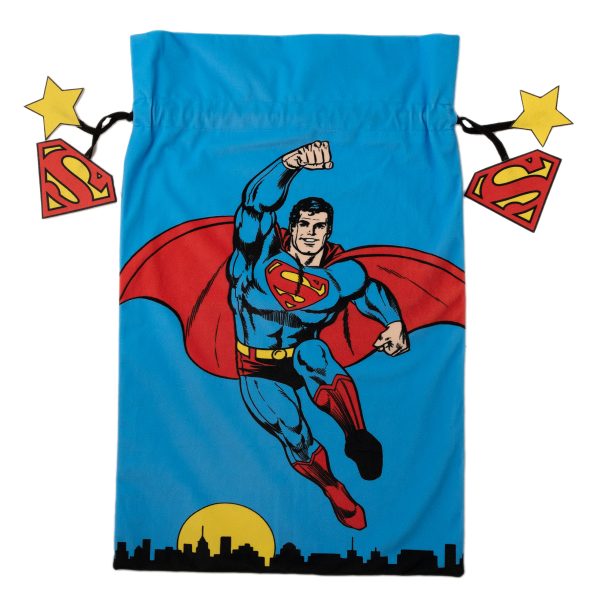 This large Christmas Gift Sack is perfect for holding all the gifts for your Super-human this Christmas! Made from durable polyester, this bright blue gift sack features Superman in his iconic flying pose soaring over a silhouetted city scene. This sack measure  45 cms x 75 cms  and the bag ties feature the Superman Logo and Yellow star on both side