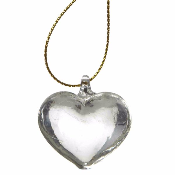 A Simple Clear Glass Heart Hanging Decoration, hanging from a gold thread.