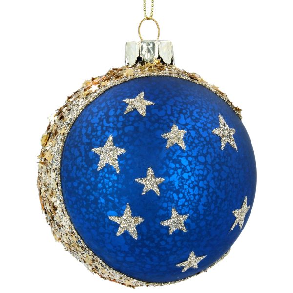 An 8cm round glass Christmas bauble by Gisela Graham. A bright royal blue with one segment decorated in gold glitter and sequins in a shape that resembles the crescent moon. The moon is flanked by a constellation of golden glitter stars. Shown against a white background.