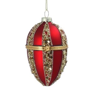 A 13cm glass trinket box Christmas tree decoration. This egg shaped bauble has a hinged lid that opens to reveal a hiding space. The bauble is decorated in alternating segments of matt red paint and gold glitter and jewel embellishments. The hinge and clasp are gold.