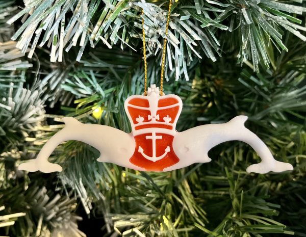 3D Printed White & Red Submariners Dolphins Tree Decoration. Made locally, these 3D Printed White & red Submariners Dolphins Tree Decorations are the perfect Christmas gift for  the Submariner or sailor in your life. The measure 12cm x 4cm and feature red detail behind the crown and anchor. Supplied on a gold string ready for hanging on the tree.