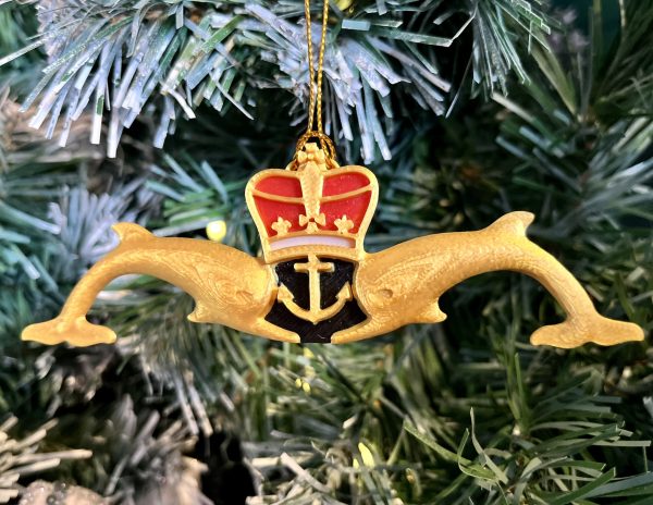 3D Printed Gold Submariners Dolphins Tree Decoration Made locally, these 3D Printed Gold Submariners Dolphins Tree Decorations are the perfect Christmas gift for  the Submariner or sailor in your life. The measure 12cm x 4cm and feature red, white and black detail behind the crown and anchor. Supplied on a gold string ready for hanging on the tree.