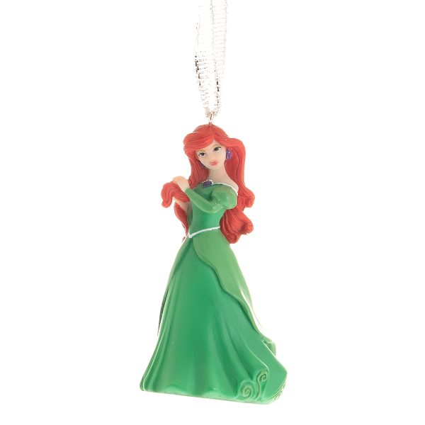 A moulded plastic Christmas tree decoration features Disney Princess Ariel from The Little Mermaid wearing her beautiful green ball gown. Her dress is jade green with a light green over skirt and matching bodice with off the sholder puff sleeves. It is decorated with white band around her waist and neck line, her look is completed with a purple sea shell in the centre of her neckline. She hangs from a white glitter ribbon, ready to hang on your tree.