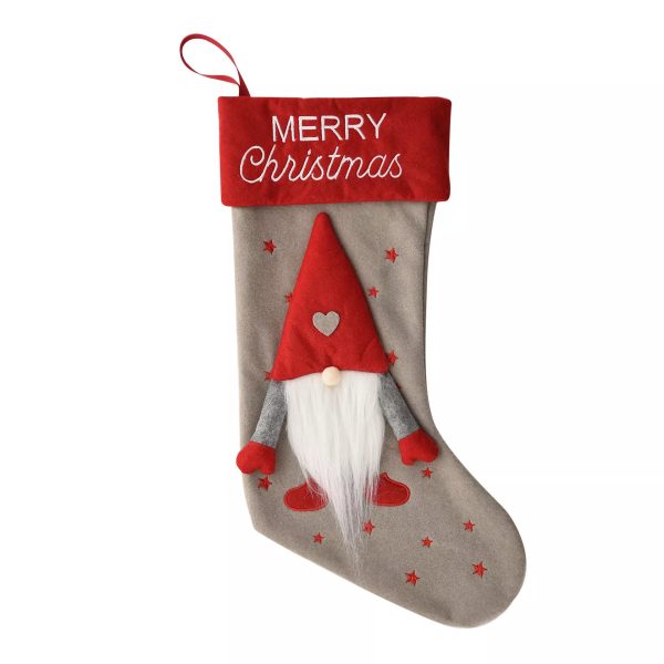 A Christmas stocking with a 3D festive Gonk on the front. Grey felt with red cuff and 'Merry Christmas' text on cuff and 3D plush Gonk with red hat, mittens and shoes and big white fluffy beard on the front.