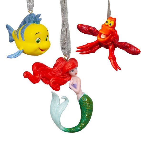 Three hanging ornaments featuring animated characters: a yellow and blue fish, a red lobster with glittery claws, and a red-haired mermaid with a green glittery tail, attached by silver ribbons.

Disney's Little Mermaid Set of Three Hanging Decorations