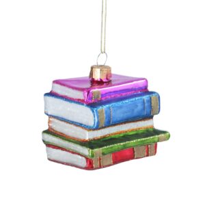 This vibrant ornament showcases a stack of books adorned with red, green, gold blue, and purple covers. It hangs gracefully from a string .