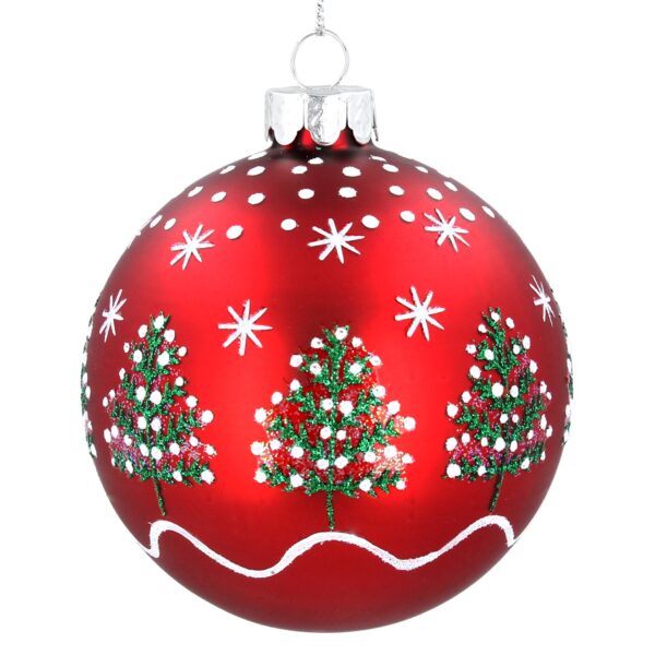 A beautiful red Christmas ornament, decorated with white stars and green Christmas trees with subtle white details, hangs elegantly by a silver loop. adding an extra touch of festive shimmer.