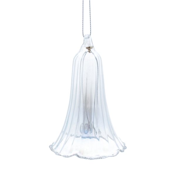 A clear glass bell-shaped ornament with fluted edges elegantly hanging from a silver string against a white background.