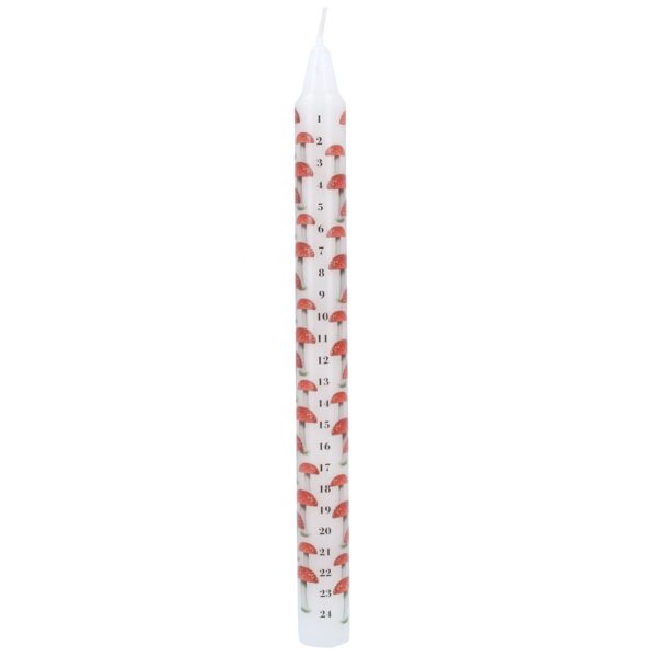 White candle adorned with numbers 1 to 24 printed vertically, featuring small red and brown gnomes next to each number. Each day reveals its charm adding a touch of magic to the countdown.