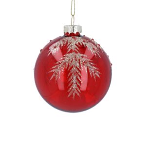 A red Christmas ornament with gold glitter fern designs and a gold cap on top.